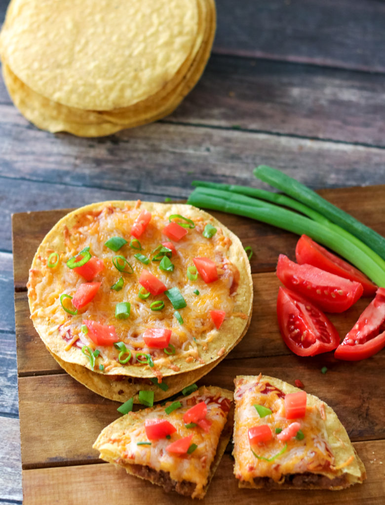 Copycat TacoBell Mexican Pizza lets you skip the drive thru and make this delicious favorite at home! I have the secret to making them taste just right!