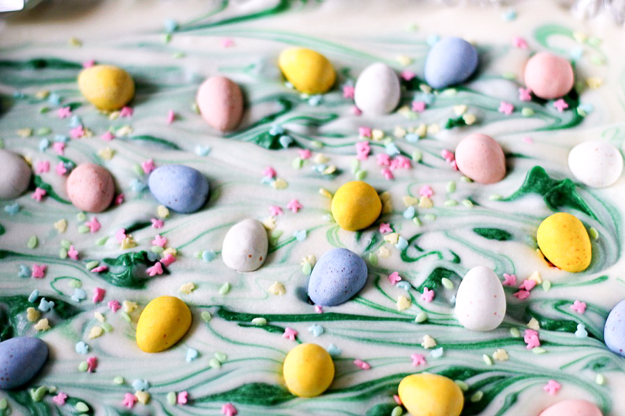 Easter Egg Bark is so easy to make and fun for the kids! Just melt chocolate and add your favorite Easter candies! So pretty!