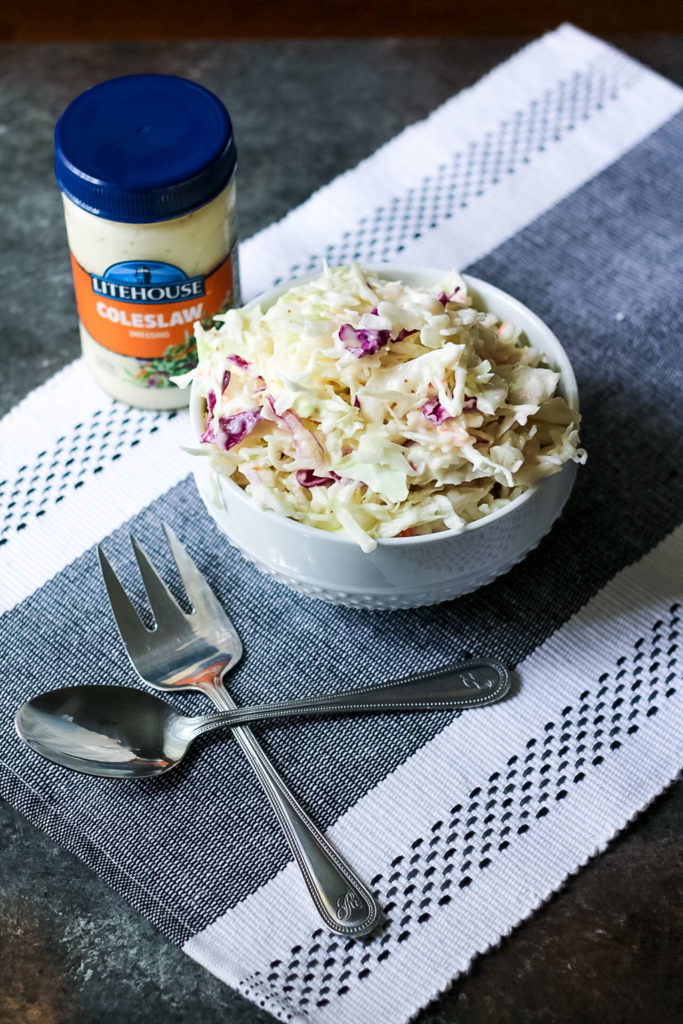 Pulled Pork Spicy Slaw Dogs are going to be your new favorite dish this summer!! Comes together super quick. Perfect easy dinner!