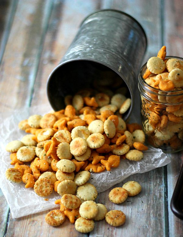 Easy Ranch Snack Mix; bite-sized crackers and cheesy goldfish all tossed in a ranch coating and toasted, it is snacking perfection made in minutes!