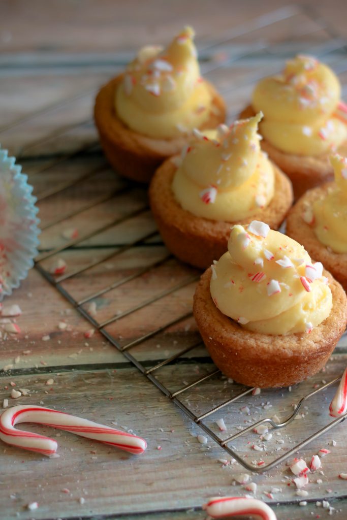 Peppermint Cheesecake Cookie Cups are so easy to make and look stunningly festive on your holiday table! Five ingredients is all you need to make these little bites of holiday joy! #peppermint #christmascookie #cheesecake