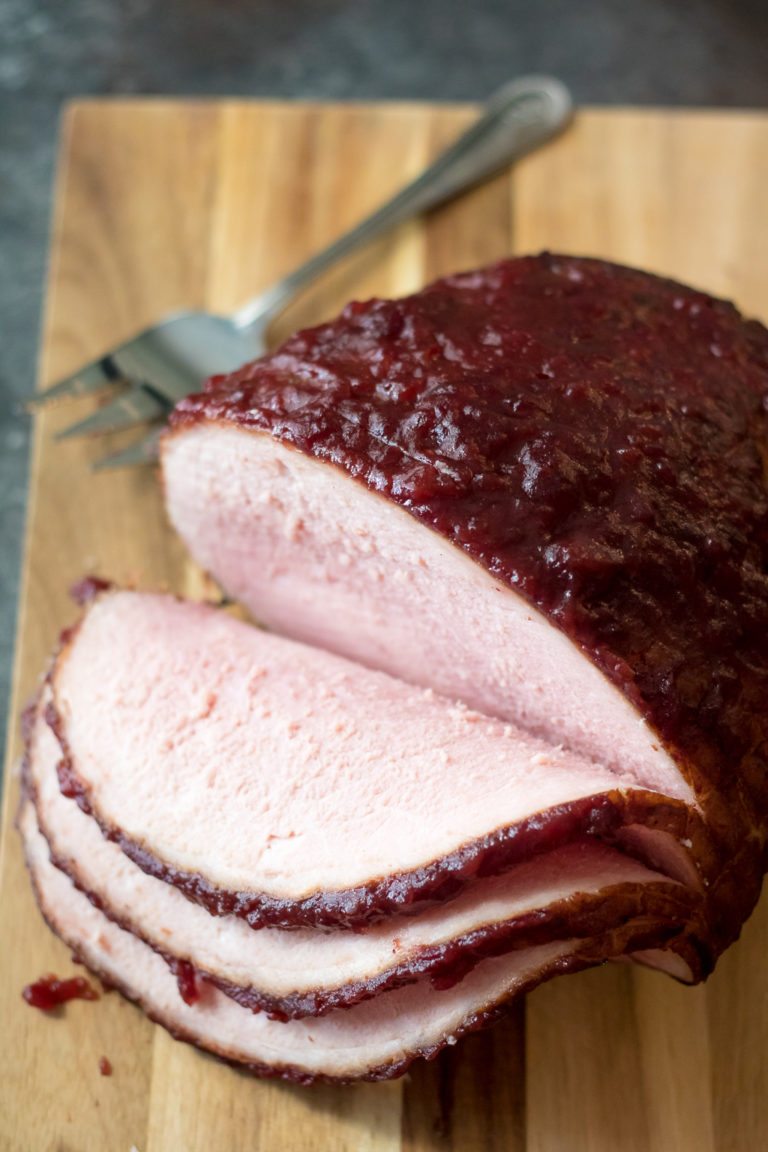 Cola Cranberry Glazed Ham is a new twist on a traditional family recipe using Coca Cola and sure to be your new favorite!