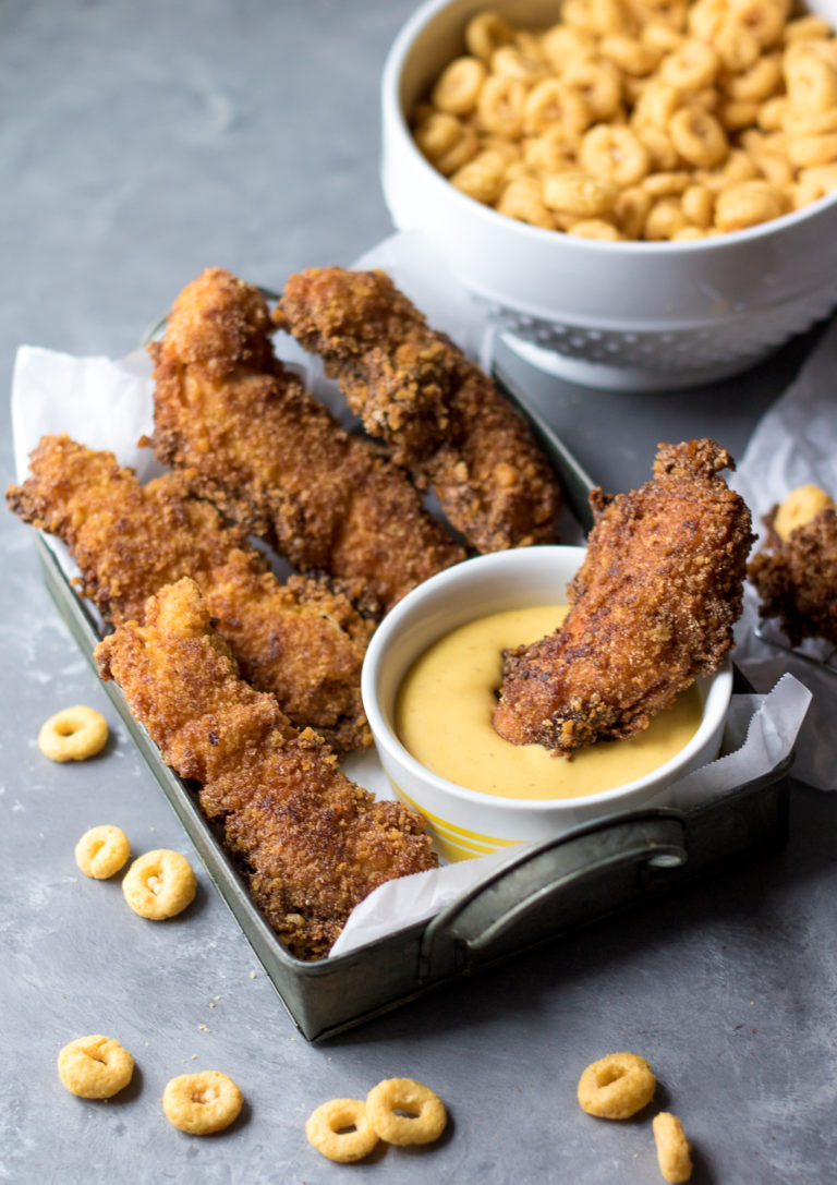 Honey Crunch Chicken Strips are the perfect weeknight dinner! Sweet honey crunch coating goes perfectly with honey mustard dipping sauce, yum!