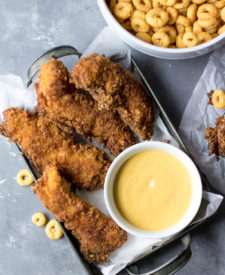 Honey Crunch Chicken Strips are the perfect weeknight dinner! Sweet honey crunch coating goes perfectly with honey mustard dipping sauce, yum!