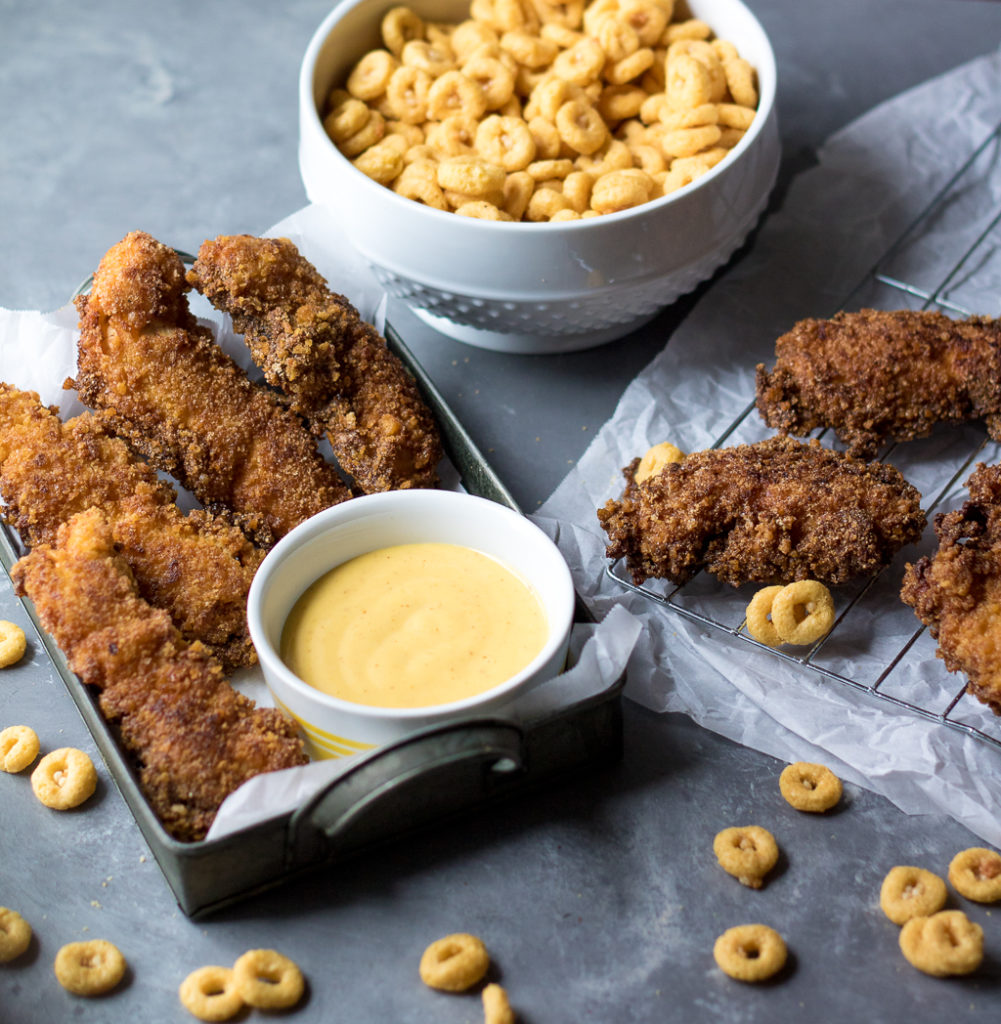 Honey Crunch Chicken Strips are the perfect weeknight dinner! Sweet honey crunch coating goes perfectly with honey mustard dipping sauce, yum!