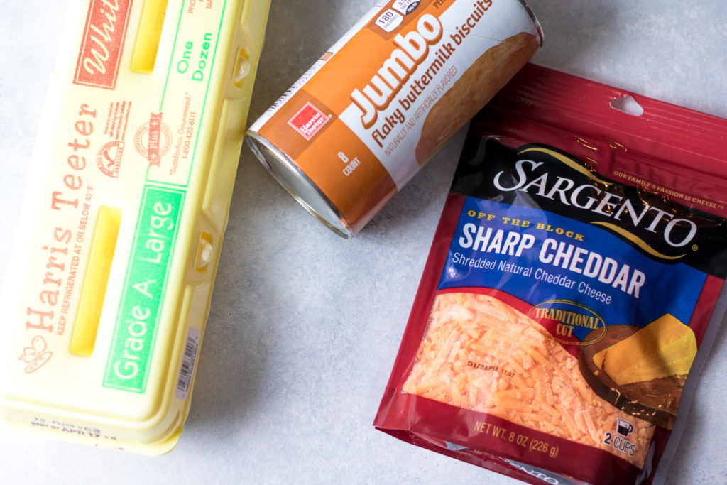 Cheesy Ham & Egg Biscuit Cups are an easy and delicious breakfast. Egg, cheese and ham all baked up in a biscuit cup is breakfast perfection!