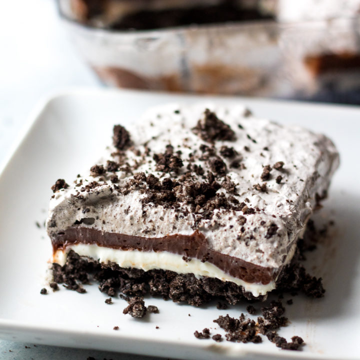 Cookies & Cream Lush is the ULTIMATE no bake dessert. Each layer is bursting with creamy, crunchy cookies & cream flavor!
