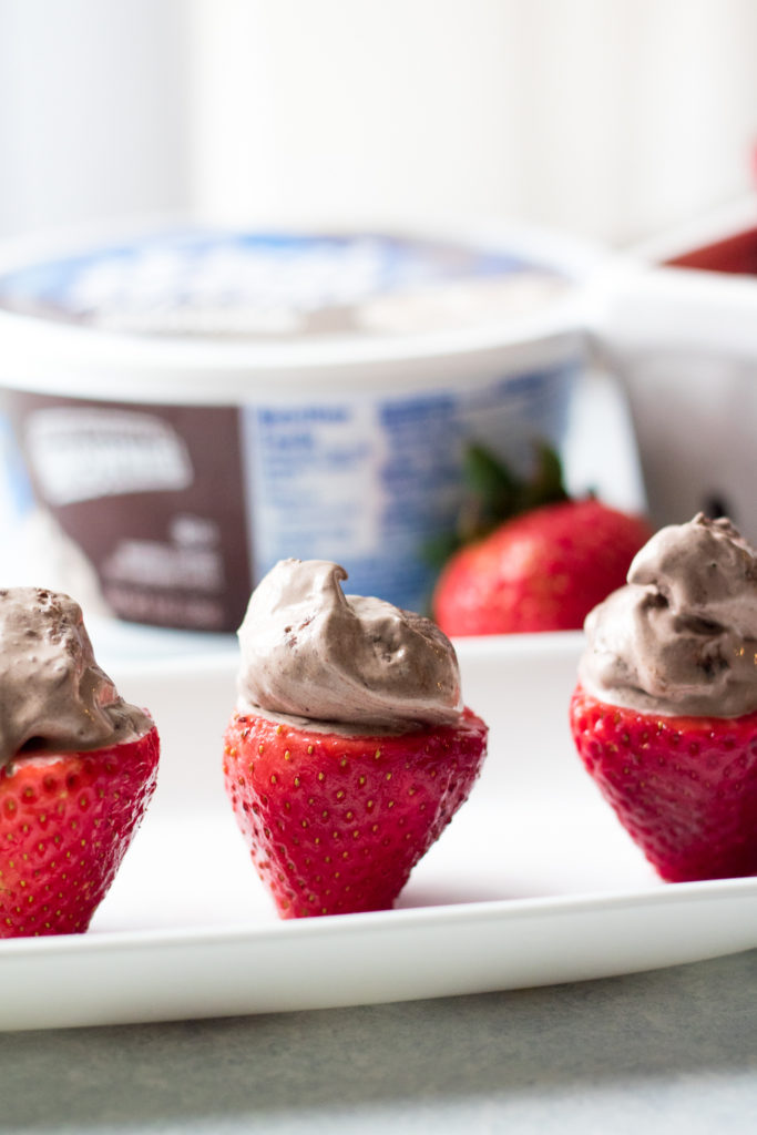 Double Brownie Stuffed Strawberries are the easy 2 ingredient snack or dessert you can whip up in minutes!! Double Brownie Cool-Whip makes these delicious!