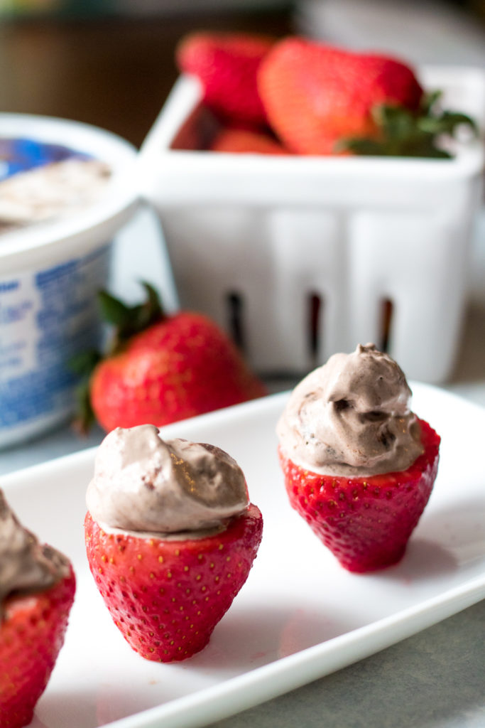 Double Brownie Stuffed Strawberries are the easy 2 ingredient snack or dessert you can whip up in minutes!! Double Brownie Cool-Whip makes these delicious!