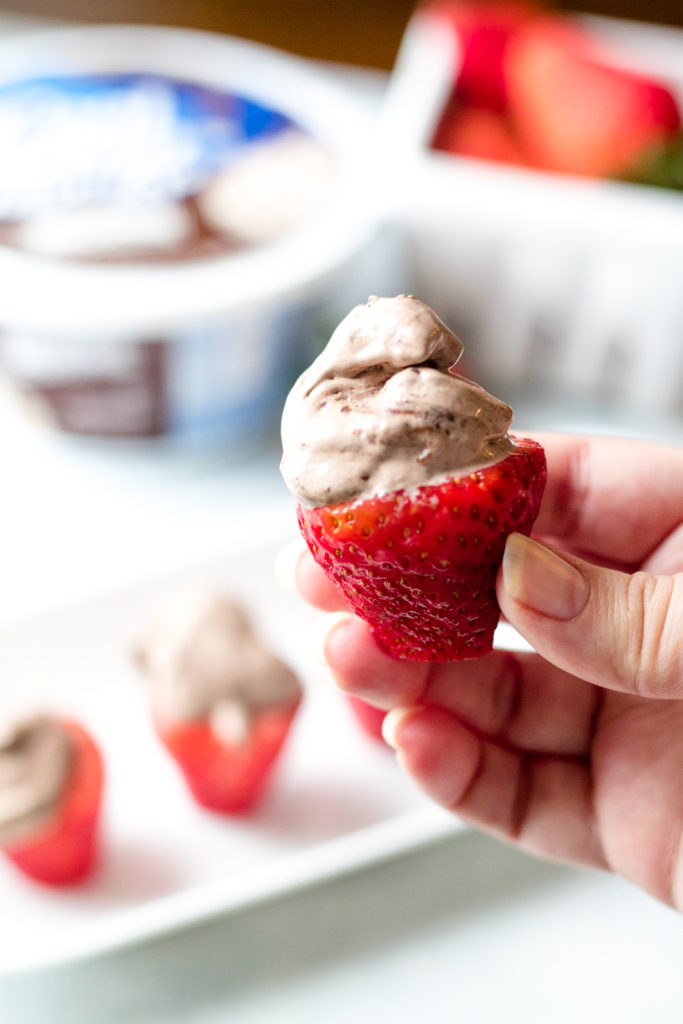 Double Brownie Stuffed Strawberries are the easy 2 ingredient snack or dessert you can whip up in minutes!! Double Brownie Cool-Whip makes these delicious!