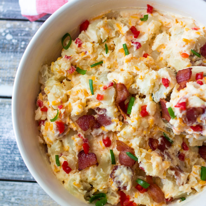 Bacon Pimento Cheese Potato Salad is the BEST potato salad you will ever make! It will be your new go-to for all your cookouts!