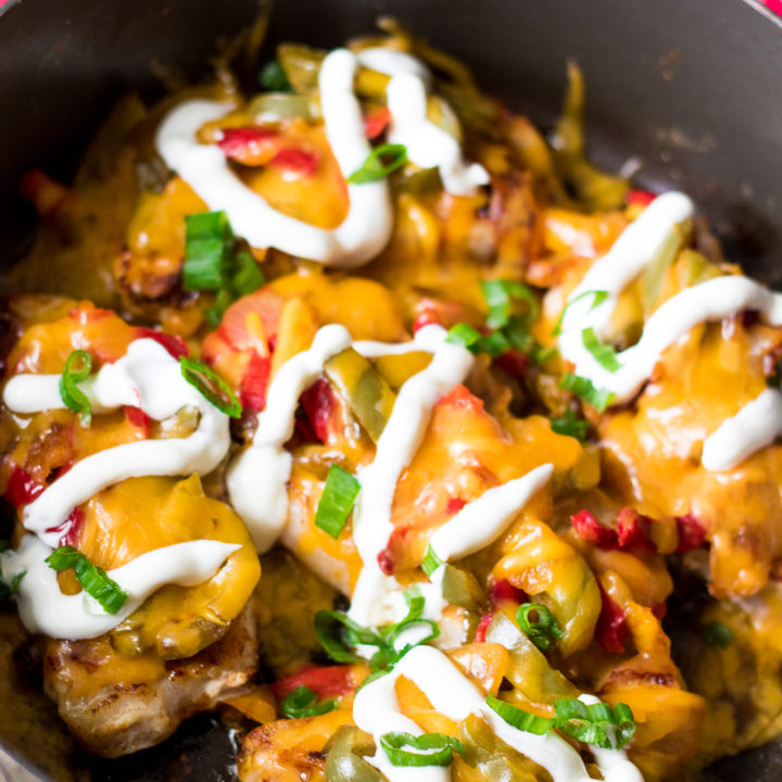 Fajita Topped Pork Chops are the quick and flavorful dinner you will want to make every week! So easy, cheesy and delicious!