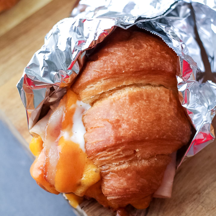 Turkey Bacon Ranch Melts are your new favorite sandwich!! Melty cheese, crispy bacon, turkey and ranch all warm and tucked into a buttery croissant.