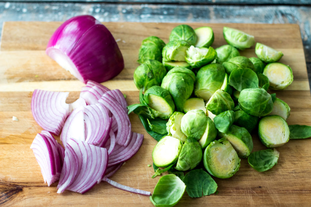 Bacon Ranch Brussel Sprouts are roasted with crispy bacon, sweet red onion and all that ranch flavor everyone loves! A real crowdpleaser!