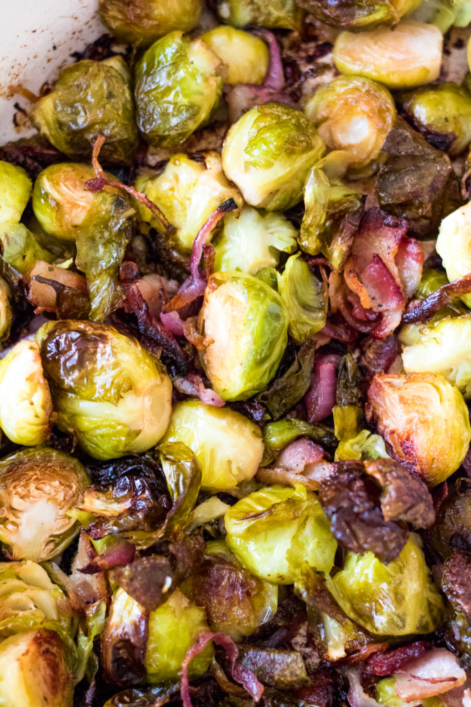 Bacon Ranch Brussel Sprouts are roasted with crispy bacon, sweet red onion and all that ranch flavor everyone loves! A real crowdpleaser!