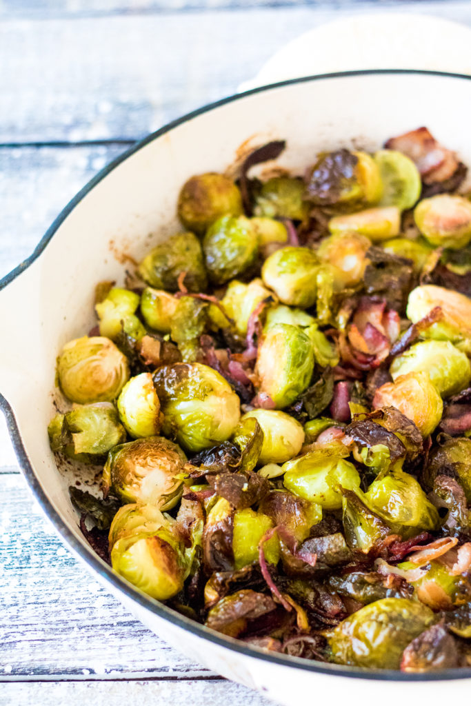 Bacon Ranch Brussels Sprouts are roasted with crispy bacon, sweet red onion and all that ranch flavor in a pan