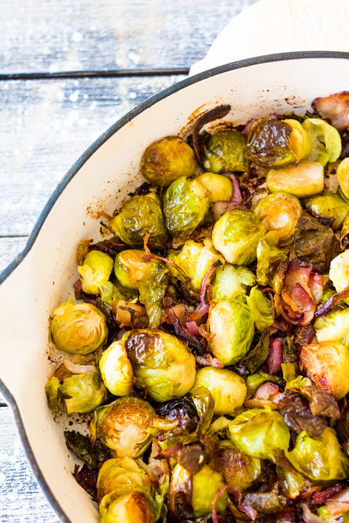 Bacon Ranch Brussel Sprouts are roasted with crispy bacon, sweet red onion and all that ranch flavor everyone loves! A real crowdpleaser!