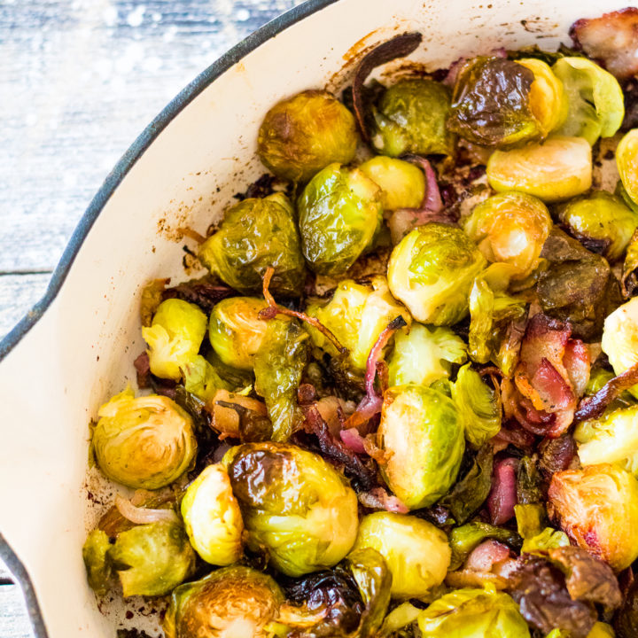 Bacon Ranch Brussels Sprouts are roasted with crispy bacon, sweet red onion and all that ranch flavor in a pan