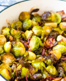 Bacon Ranch Brussels Sprouts are roasted with crispy bacon, sweet red onion and all that ranch flavor in a pan
