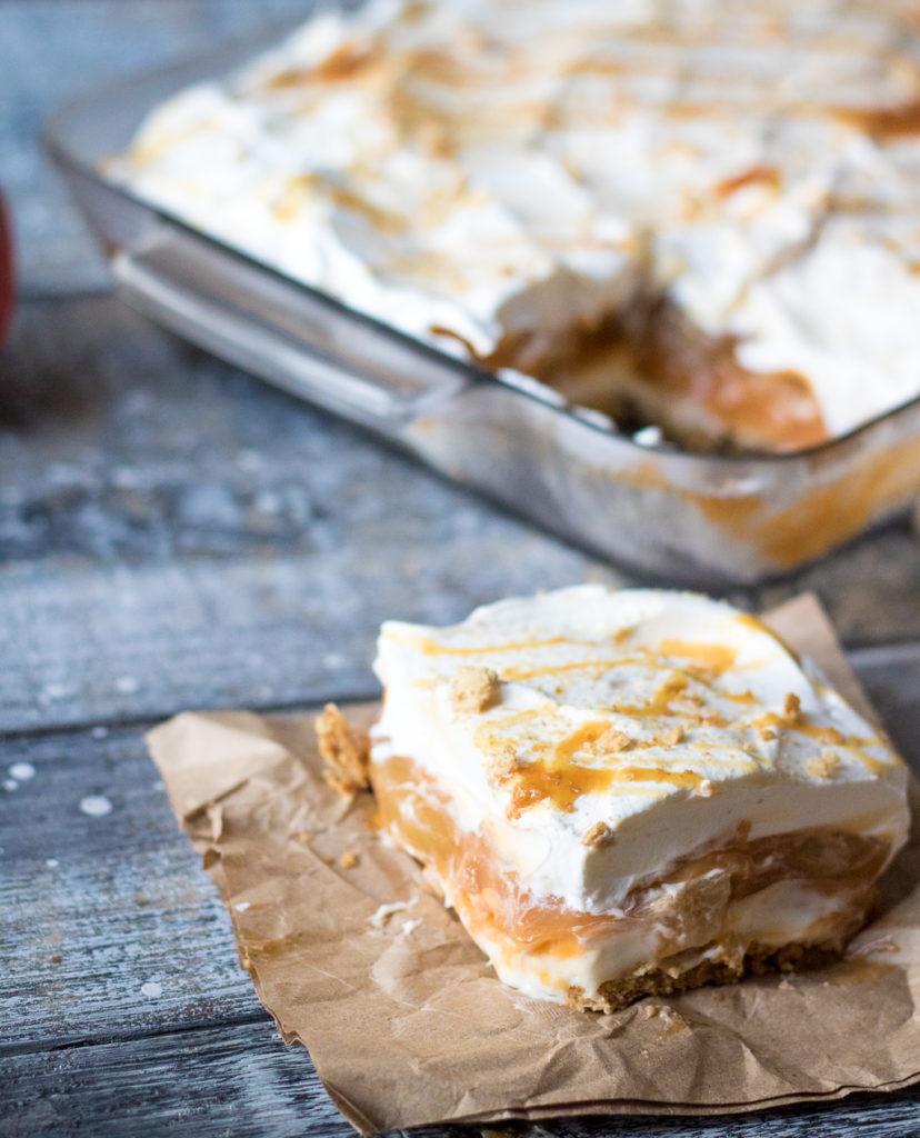 No Bake Caramel Apple Lush is perfect Fall with layers of cream cheese, whipped cream, caramel, butterscotch pudding and apple pie filling.