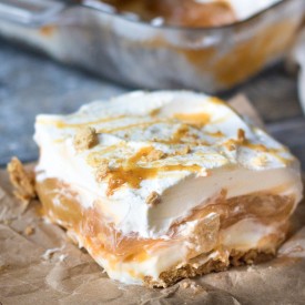 No Bake Caramel Apple Lush is perfect Fall with layers of cream cheese, whipped cream, caramel, butterscotch pudding and apple pie filling.