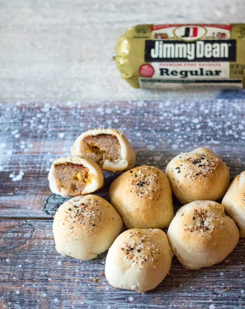 Sausage Ball Biscuit Bombs are stuffed with cheese and then baked in a biscuit bomb and topped with everything bagel seasoning to create the perfect bite!