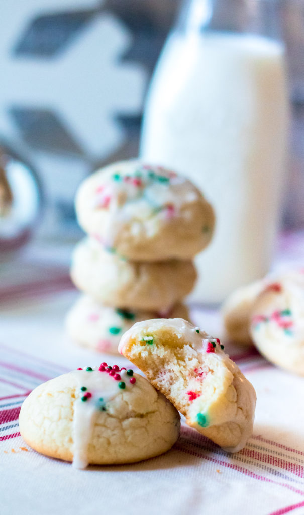 Christmas Cream Cheese Cookies are going to be your new favorite holiday cookie! They melt in your mouth and are so festive with their sprinkles.