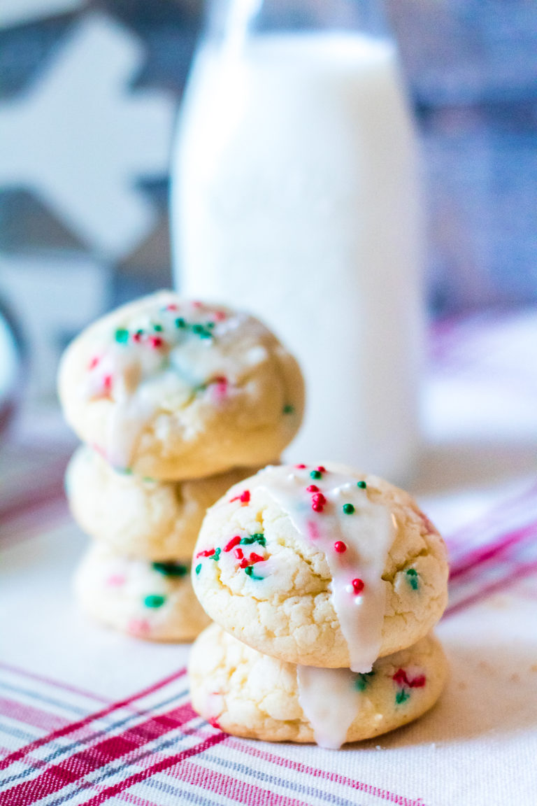 Christmas Cream Cheese Cookies are going to be your new favorite holiday cookie! They melt in your mouth and are so festive with their sprinkles.