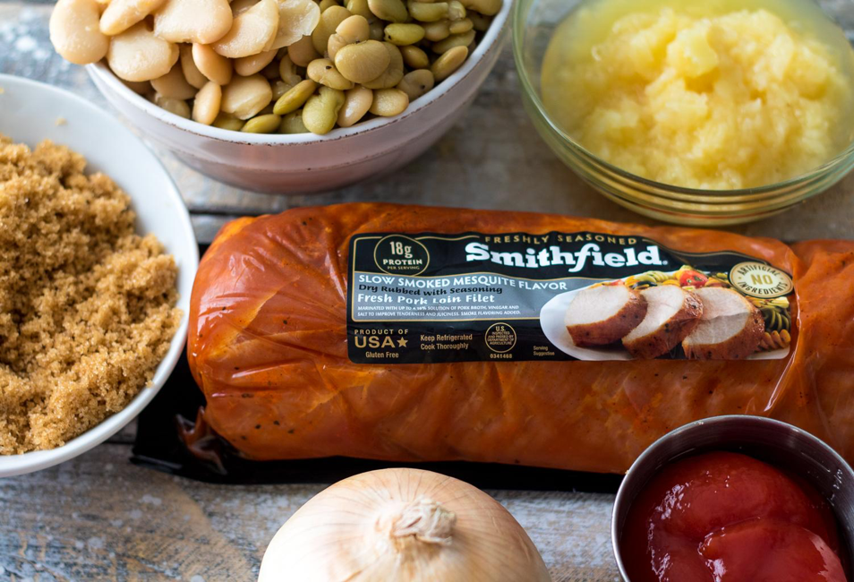 Cowboy Pork and Beansare so easy to make right in the slow cooker! Tender pork and a secret ingredient give this dish amazing flavor!