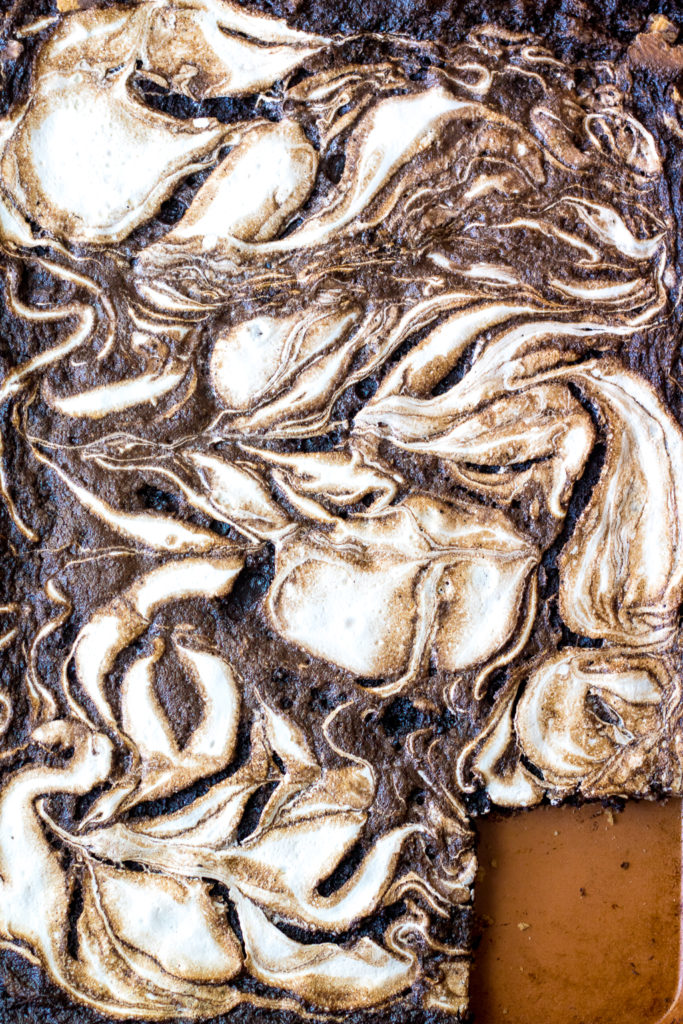 S'mores Slab Pie is the perfect dessert! Graham cracker crust, fudgy pie and that marshmallow swirl are out of this world!