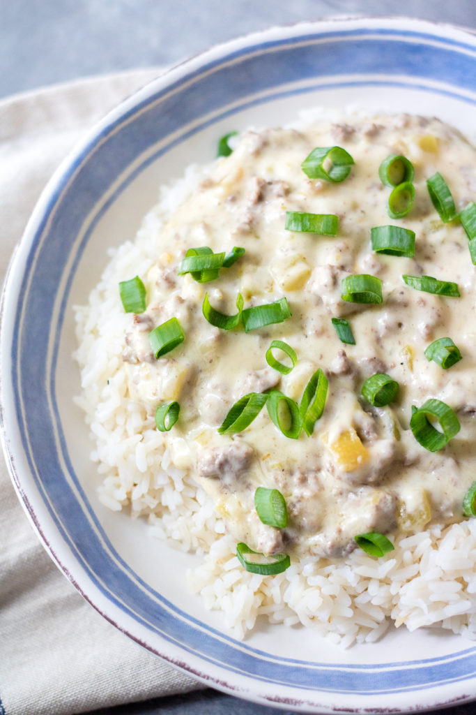 Cheesy Green Chile Beef & Rice is the perfect, easy, quick dinner that everyone will love! Full of flavor but not too spicy it is a crowd pleaser!