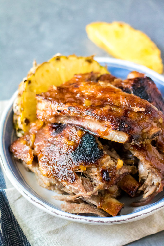 Slow Cooker Pineapple BBQ Ribs cook right in the slow cooker so no need to heat up the kitchen. Full of sweet pineapple flavor, these tender ribs are great!