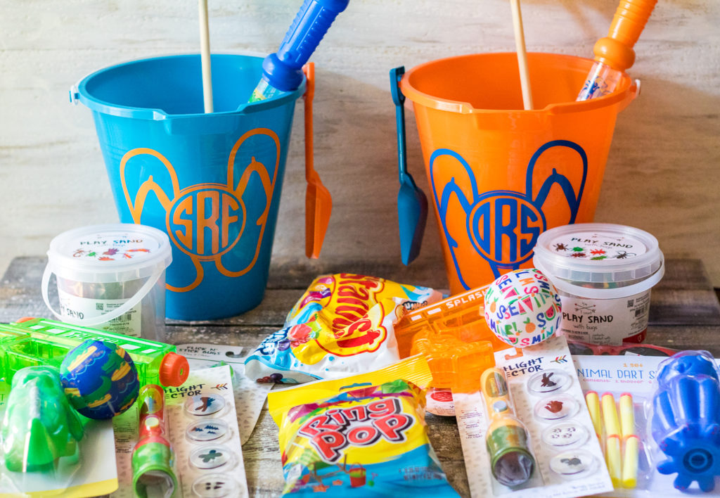 Super fun inexpensive buckets full of goodies for the summer! Perfect for the last day of school or the first day of summer!
