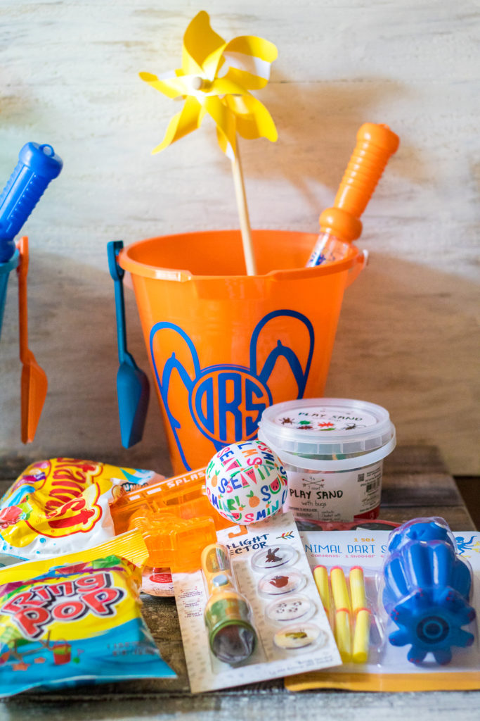 Super fun inexpensive buckets full of goodies for the summer! Perfect for the last day of school or the first day of summer!