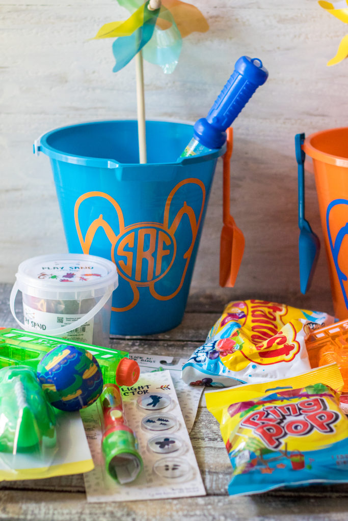 Super fun inexpensive buckets full of goodies for the summer! Perfect for the last day of school or the first day of summer!