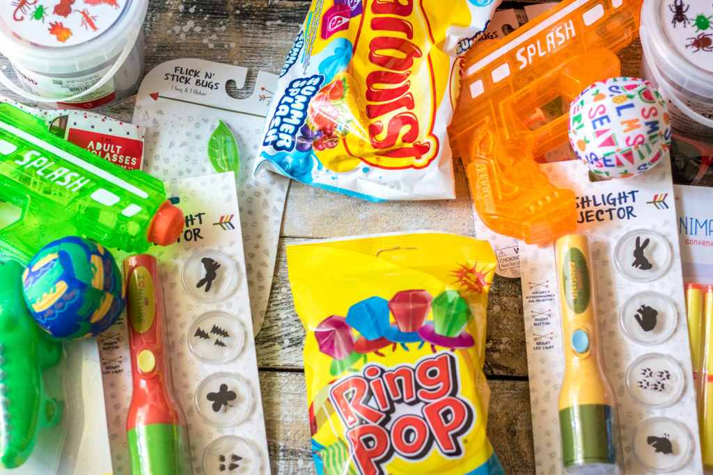 Super fun inexpensive buckets full of goodies for the summer! Perfect for the last day of school or the first day of summer!