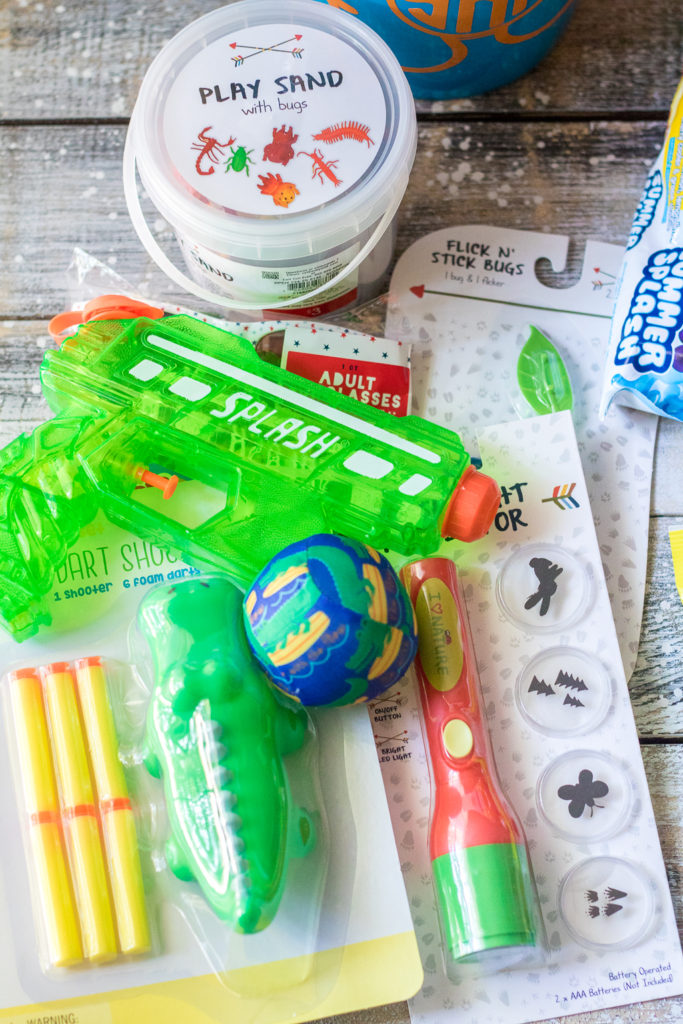 Super fun inexpensive buckets full of goodies for the summer! Perfect for the last day of school or the first day of summer!