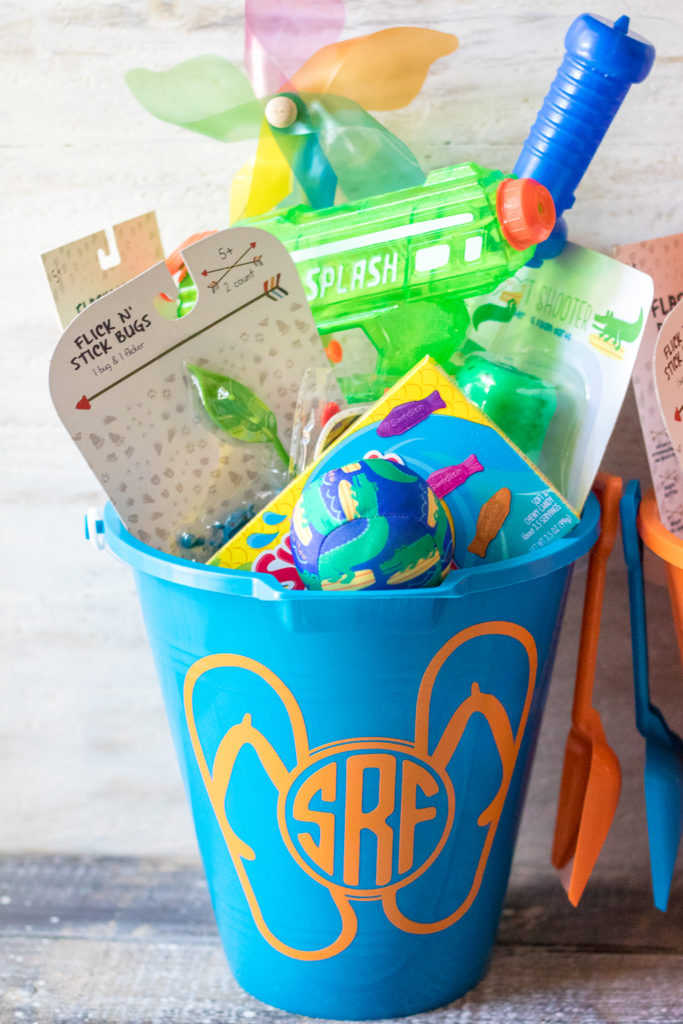 Super fun inexpensive buckets full of goodies for the summer! Perfect for the last day of school or the first day of summer!