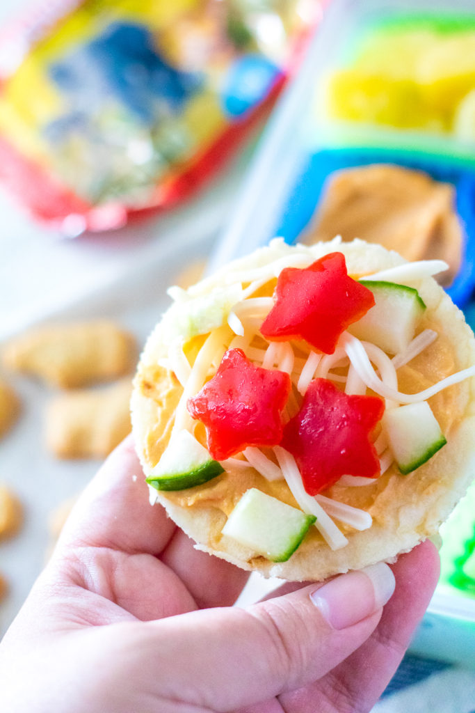 DIY Mediterranean Pizza Lunch Box is a fun and delicious lunch your kids can make themselves! Perfect for back to school and a change from sandwiches!