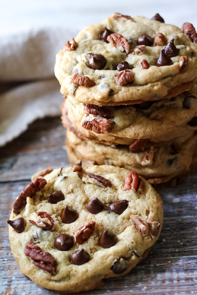 Giant Chewy Chocolate Chip Pecan Cookies are a favorite in our house! Perfectly chewy, giant cookies studded with chocolate and pecans!