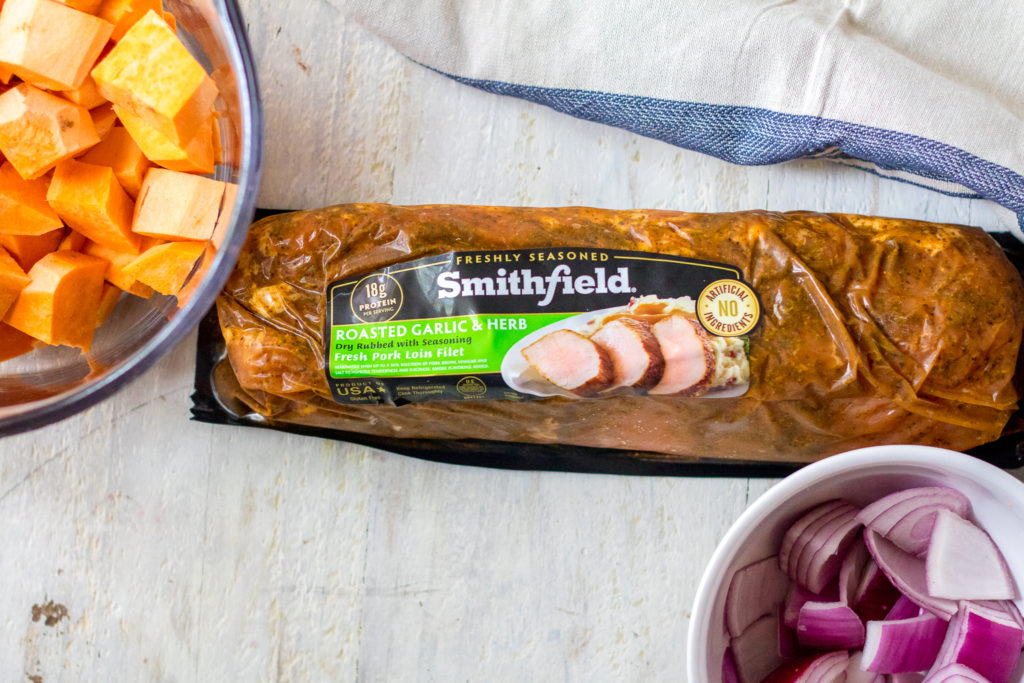 Smoky Sweet Potato and Pork Hash is your new favorite sheet pan meal. Flavorful pork, roasted sweet potatoes, caramelized onions come together in no time!