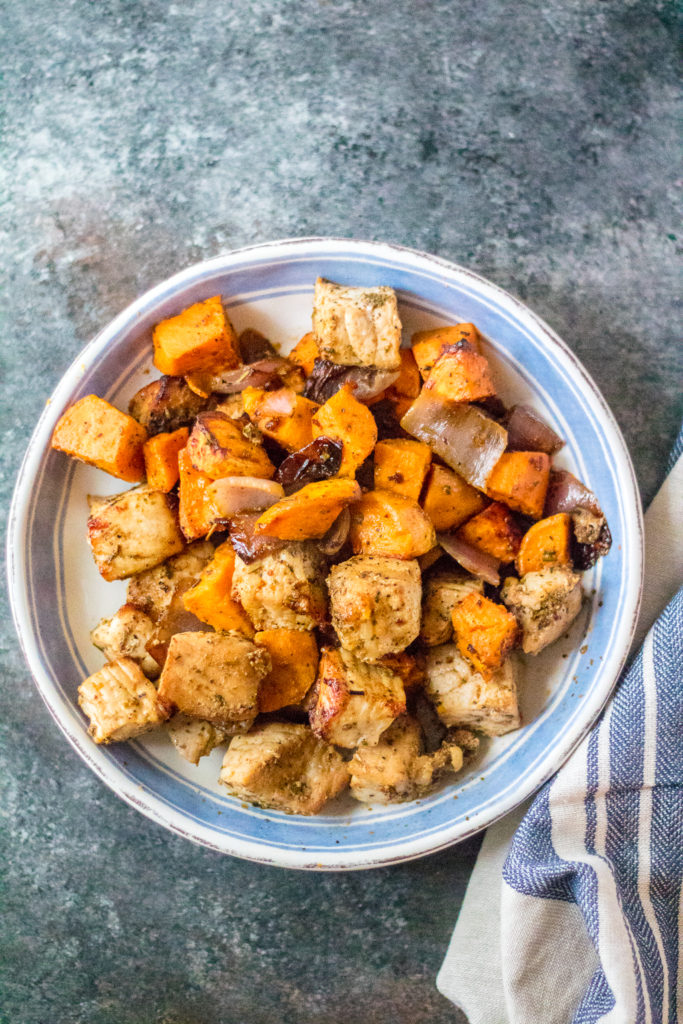 Smoky Sweet Potato and Pork Hash is your new favorite sheet pan meal. Flavorful pork, roasted sweet potatoes, caramelized onions come together in no time!