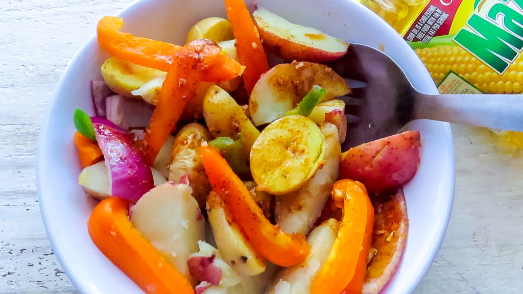Chicken Fajita Hash is my new favorite thing to grill! Tender marinated chicken on top of grilled potatoes and veggies, yum!