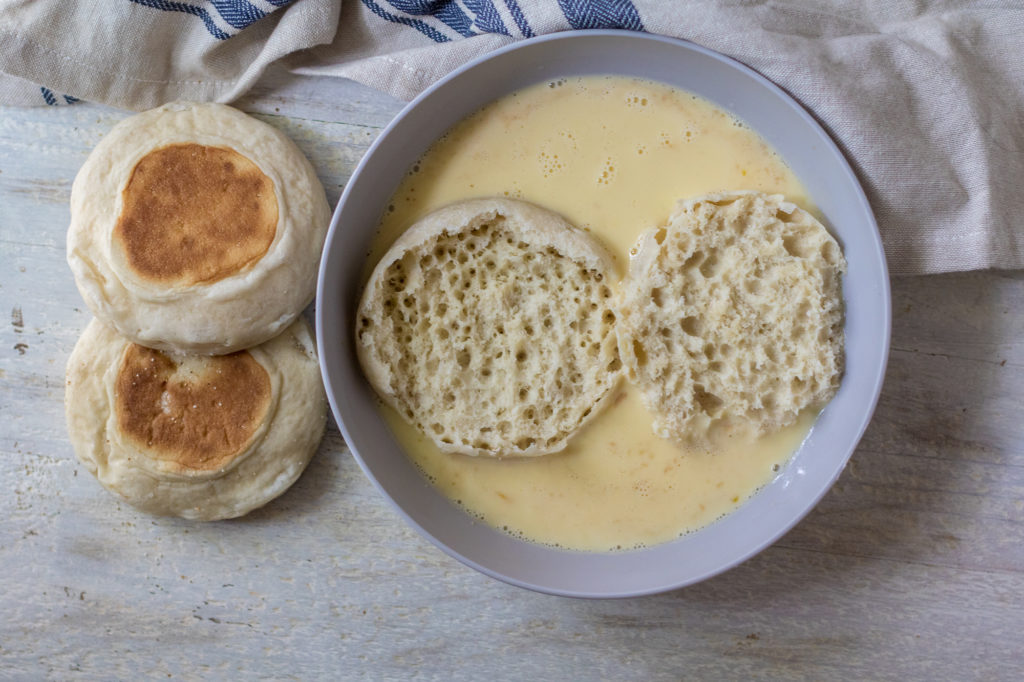 Lemon English Muffin French Toast is our new favorite breakfast. The nooks and crannies of the English Muffin is perfect for the tart lemon curd!