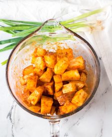 Seasoned potatoes in bowl