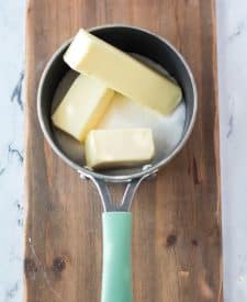 Butter and sugar melting in pot