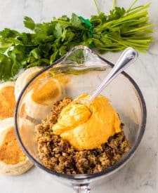 Ingredients for Old English Sausage Muffins. Browned sausage, old english cheese in a bowl.