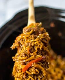 Slow Cooker Beef Ramen in a spoon in a slow cooker
