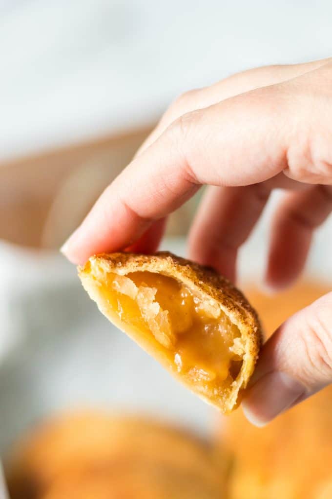 Caramel Apple Empanada cut in half showing the inside