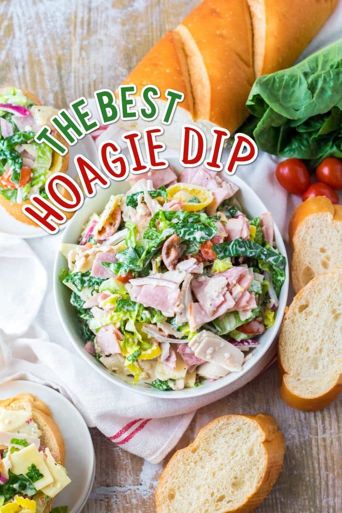 Hoagie Dip piled in a white bowl with bread around it.